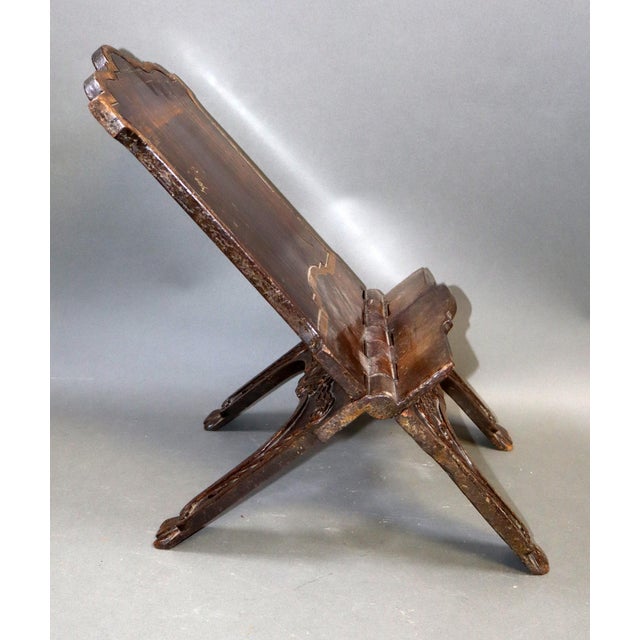 A 19th century French folding Bible or book stand in Carved walnut. It looks as though it may have come from a cathedral...
