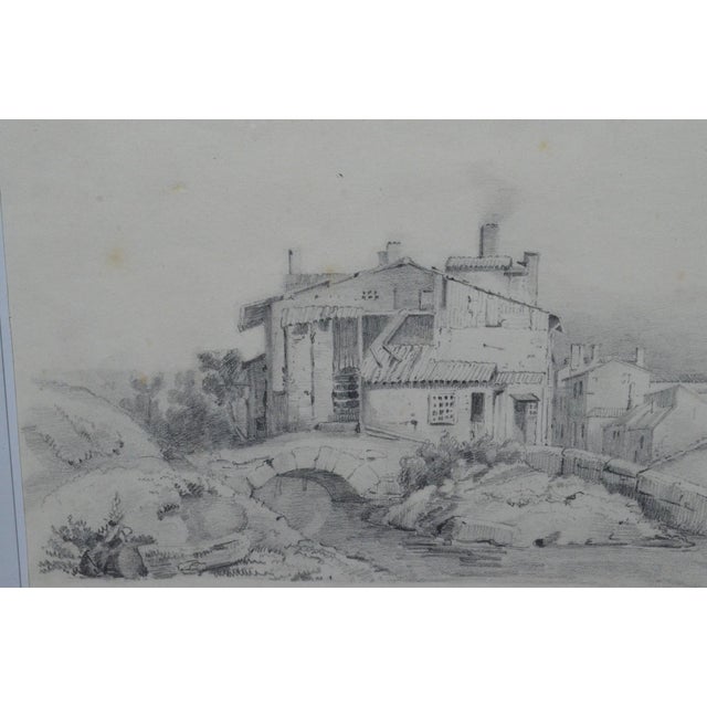 Charming 19th-century French School graphite drawing depicting a group of rustic houses set within a rocky landscape....