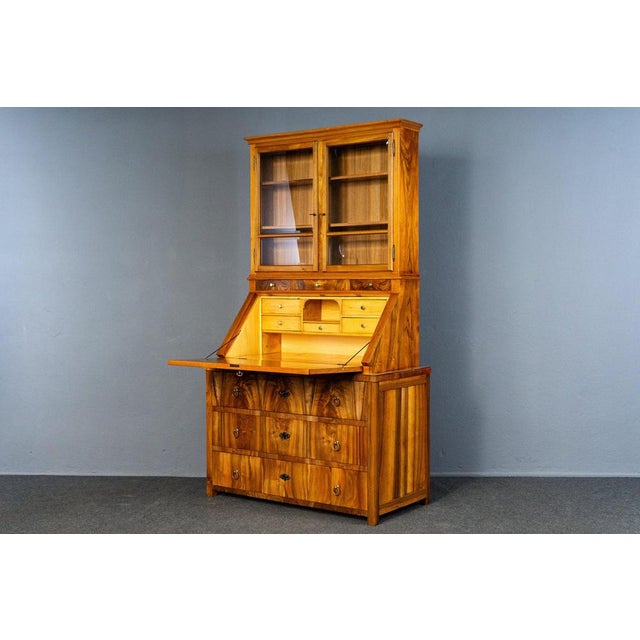 Object: Slanted flap top secretary Epoch & style: Biedermeier style - 1st half of the 19th century, showcase top 2nd half...