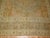 A fine Persian Tabriz rug predominantly orange including some silver, olive and ivory shades as well. The medallion...