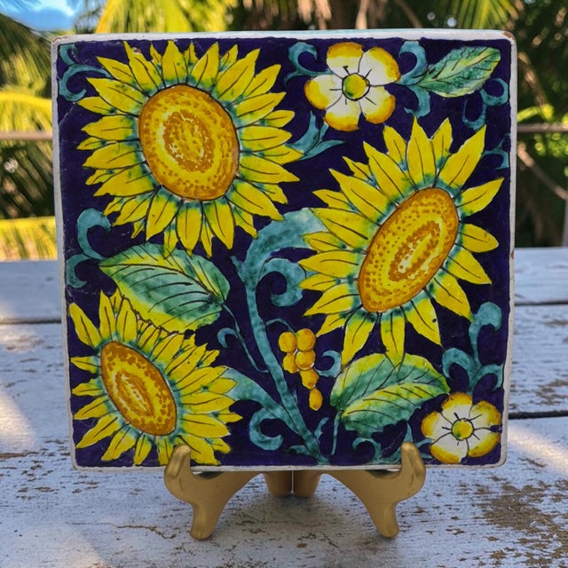 This Vintage Hand Painted Terra-Cotta Sun Flower Tuscan Wall Hanging Tile Trivet measures 9 inches and is a beautiful...