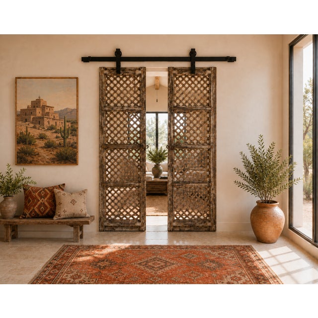 Antique Indian Carved and Sun Bleached Teakwood "Jali" Trellis Door, late 19th century from Rajasthan, features a trellis...