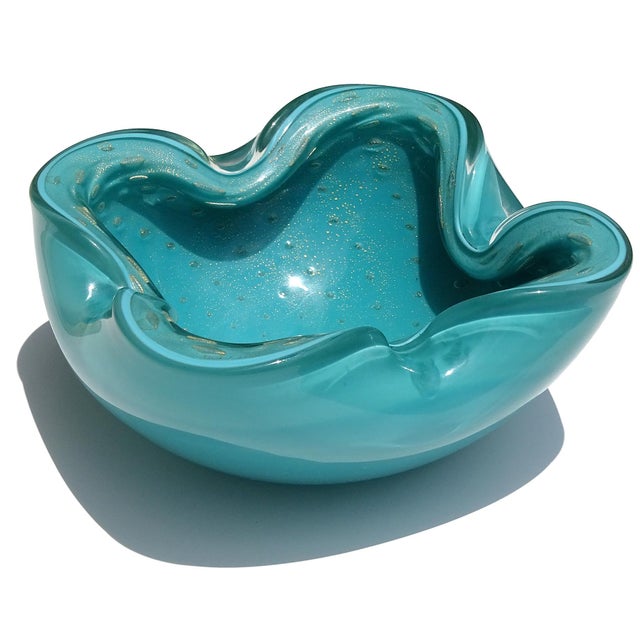 Beautiful vintage Murano hand blown teal blue/green and gold flecks Italian art glass bowl. Documented to designer Alfredo...