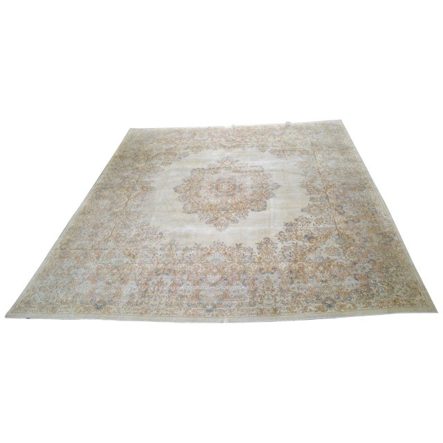 Hand-knotted with care using traditional rug-making techniques, this wool rug blends timeless craftsmanship with a modern...