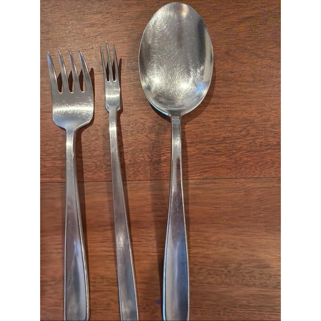 The Gense Facette 18-8 Stainless Flatware Lot of 9 is a vintage set of Mid-Century Modern style cutlery originating from...