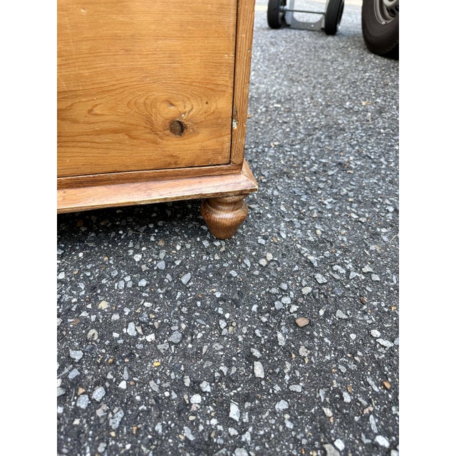 This is a lovely antique pine chest! This piece dates to the 19th century and has lovely patina. The wood has a warm glow,...