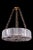 Single Tier Chandelier with Czech crystal vertical framing elements, sunburst crystal patterning on bottom.