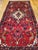 "This vintage hand-knotted Persian Malayer gallery rug is a lively and rare find from the mid-1900s, celebrated for its...