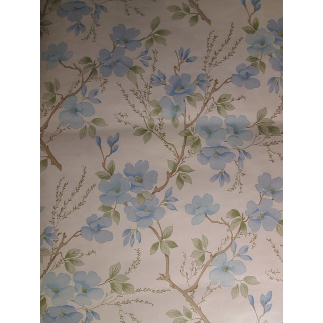 Vintage 1970s Wallpaper. Blue flower vine motif with green leaves on an off white background. One roll = 5 meters x 51 cm....