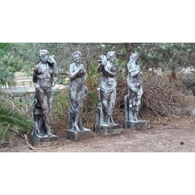Spectacular Italian Sculpture "The Four Seasons" from the early 20th century Cement Original patina Sculpture height:...