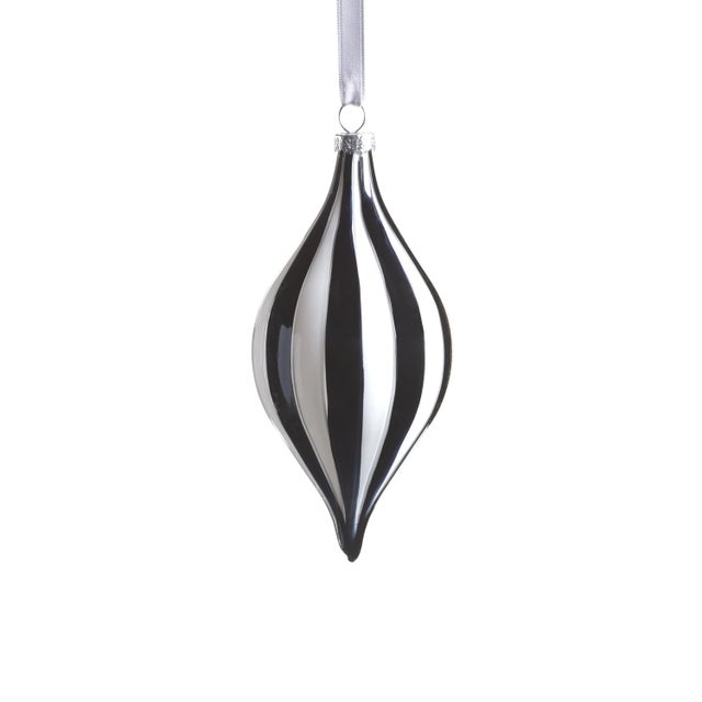 The Monochrome Stripe Glass Hanging Holiday Ornaments bring a touch of modern elegance to your festive decor. Each...