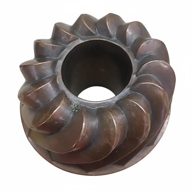 Antique handmade copper Turk’s Head / bundt mold with a deep swirl design and central tube. Crafted from heavy-gauge...
