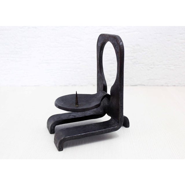 Beautiful brutalist candle holder made in the 70s/80s. Superb brutalist creation in cast iron, this candle holder will fit...
