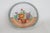 This darling Small Plate is made out of porcelain with lusterware glaze. This lovely plate is marked on the bottom as...
