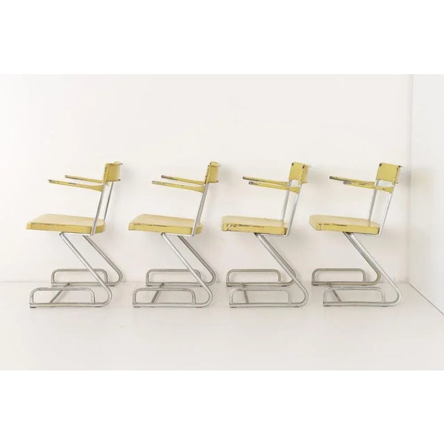 Stacking Chairs Designer: Factory Design Year: around 1940 Manufacturer: unknown swiss steel-furniture manufacturer...