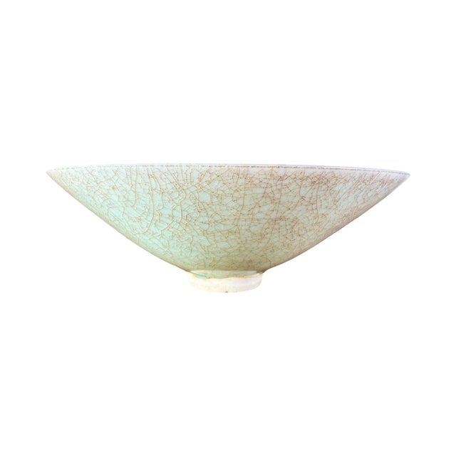 Beautiful Chinese celadon "Fangge" porcelain flared rim bowl, with swirling central motifs. This beautiful bowl was made...