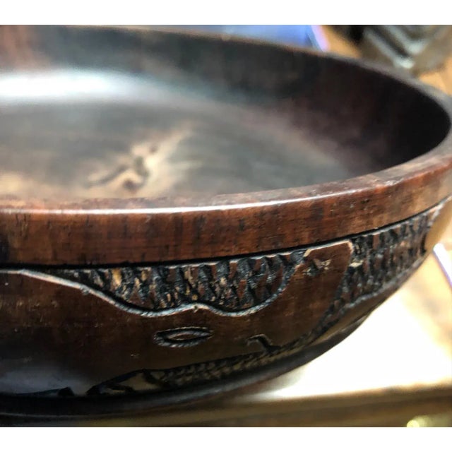This fabulous Handcarved African Hardwood Rhino Bowl / Catchall (walnut?) is absolutely amazing with its handcarved Rhinos...