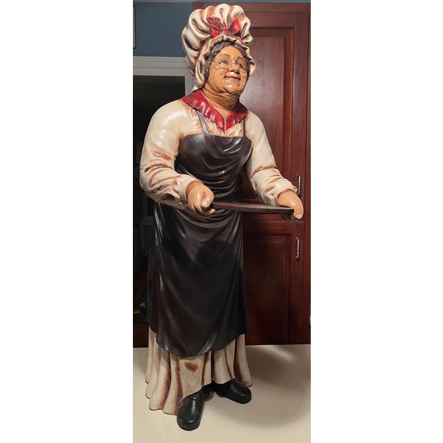 Detailed 3-dimensional figure holding a removable tray serves as both a functional tray holder and a decorative accent....