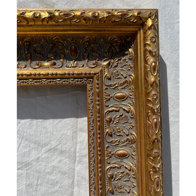 Very large ornate gold Baroque-style picture frame in solid wood. Absolutely beautiful, this frame is perfect for...
