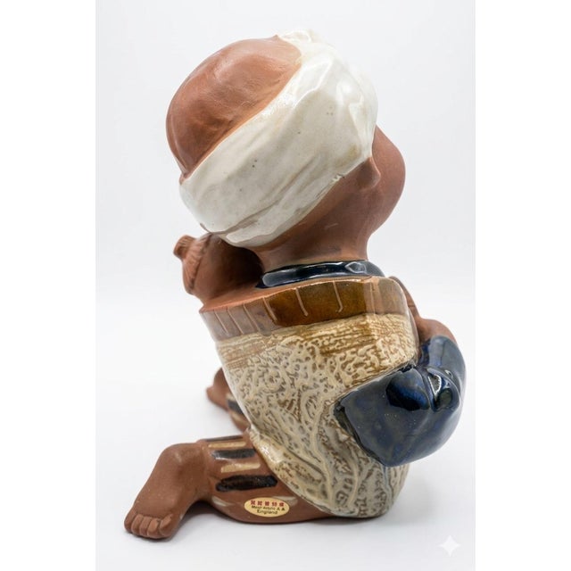 Authentic Mid-Century Japanese Craftsmanship This charming vintage ceramic figurine by the renowned Seto Craft K.K....