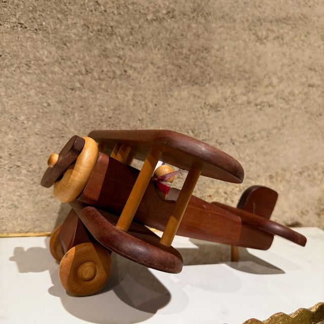 For your consideration, a vintage modern custom made wood plane. Stamped underneath "HANDCRAFTED by The Toy Maker"....