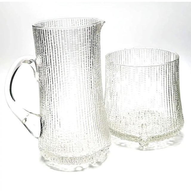 Offered is a set of 6 molded-glass footed cocktail bar wares from Iittala's "Ultima Thule" collection designed (originally...