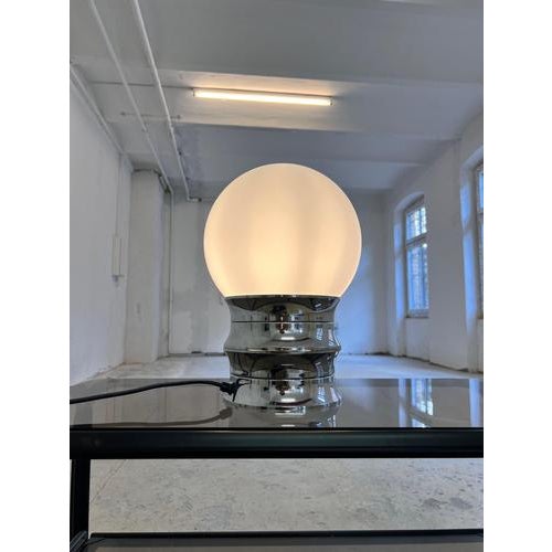 This table lamp from veb narva (leuchtenbau lengefeld) is an outstanding collector's item from the design history of east...