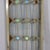 A distinguished pair of antique leaded glass and jeweled windows, dating to approximately 1920 and in the manner of Frank...