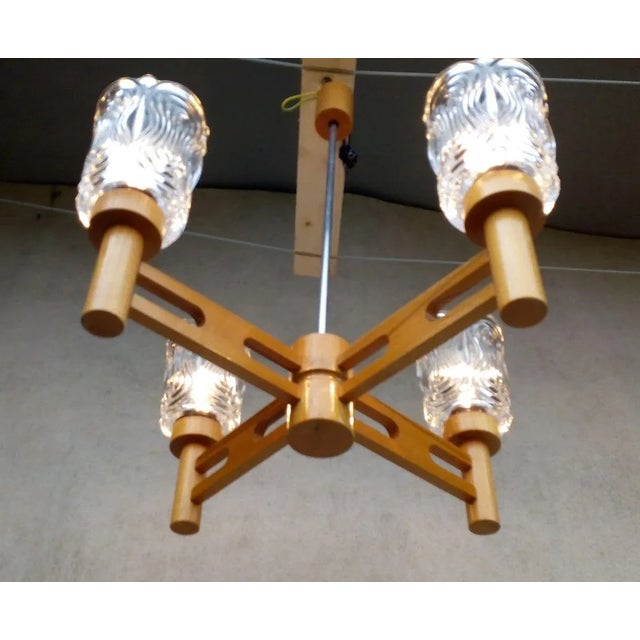 Very nice and preserved retro vintage piece, wooden, 4 light elements of rough translucent glass. cleaned, inspected,...