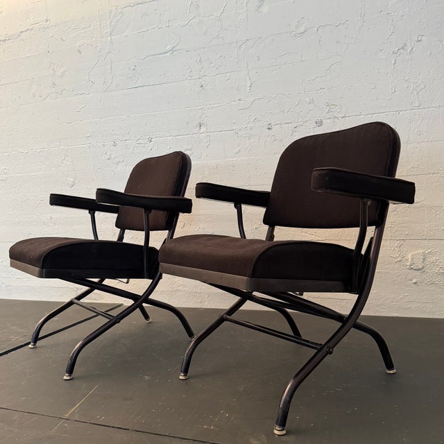 This pair of 1940s folding armchairs was designed by Warren McArthur for Mayfair Industries. The chairs represent a...