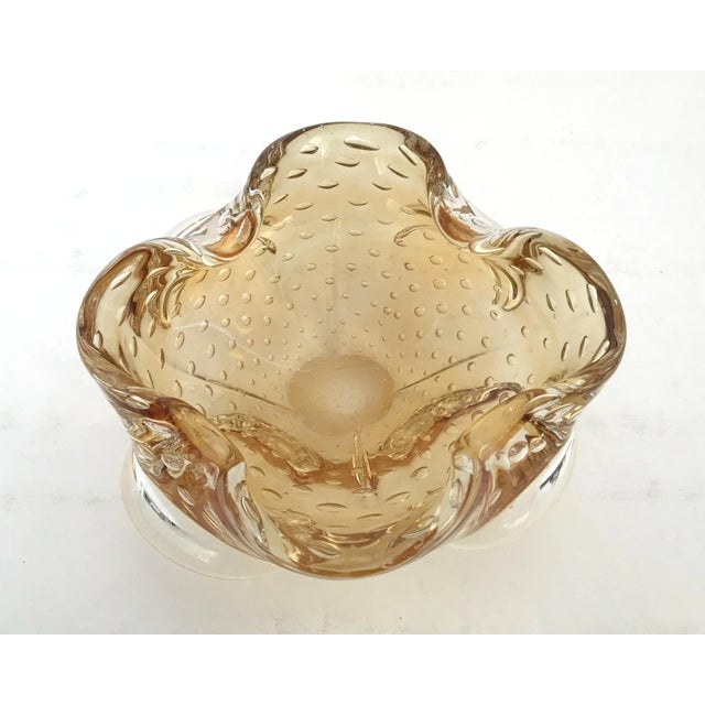 Vintage Italian amber Murano glass ashtray or bowl carefully hand blown with small bubbles inside the glass using pulegoso...
