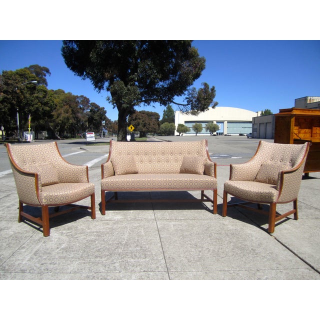 A beautifully scaled Pool Henningsen settee and pair of chairs. Seat height is 16" and arm height is 22". Seat depth is 20".