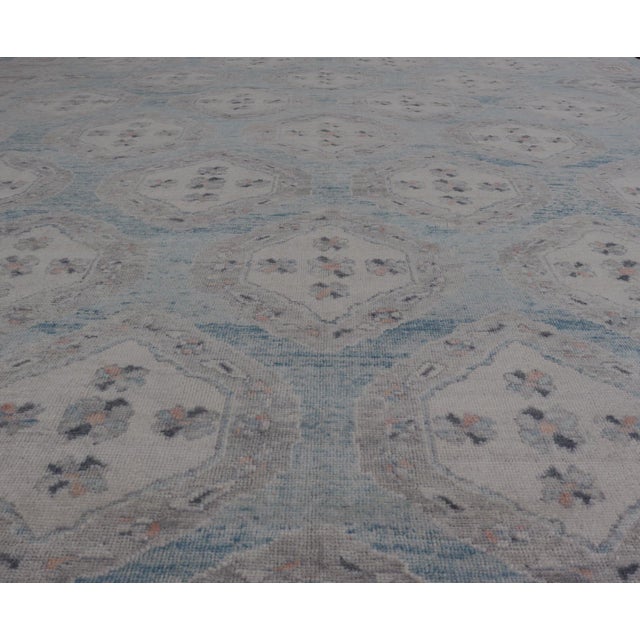 Textile All-Over Tribal Motifs Design Light Blue With Hints of Orange Turkish Oushak Rug For Sale - Image 7 of 12