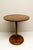 A Mid Twentieth Century Modern side table crafted from rich walnut, featuring a beautifully matched veneer top and a clean...