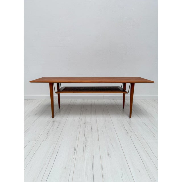 Iconic danish coffee table model fd 516 designed by peter hvidt & orla mølgaard-nielsen for france & daverkosen during the...