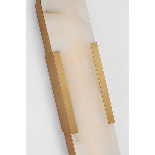 Description: The Melange series by Kelly Wearstler contrasts natural alabaster with metal in rounded forms, blending...