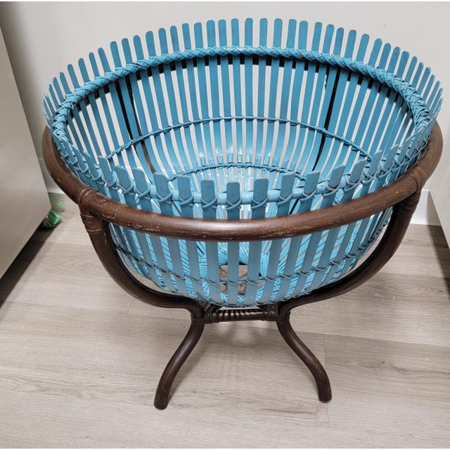 This unique item is a Mid-Century "Fish Trap" basket side table, famously associated with the style of Italian designer...