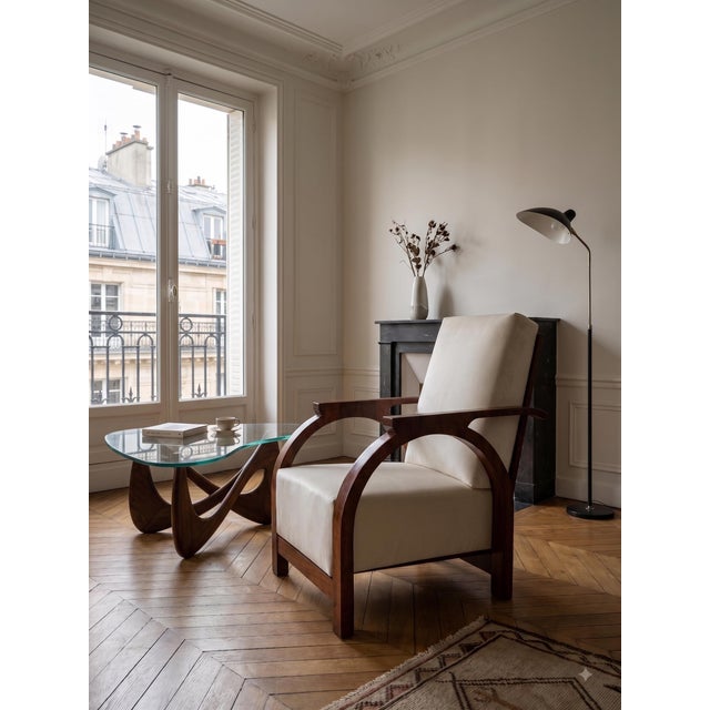 This elegant recliner perfectly embodies the refinement and geometric rigor typical of Italian Art Deco design. The...