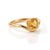 Bask in the warm, golden glow of this sunny solitaire design. The gracefully curved band wraps fluidly around the vibrant...