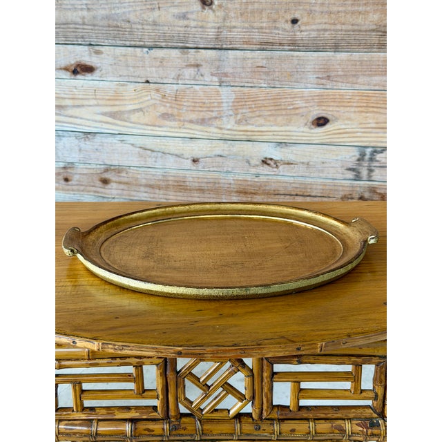 Classic Italian craftsmanship with a warm, timeless finish. This vintage oval serving tray by Vietri was handcrafted in...