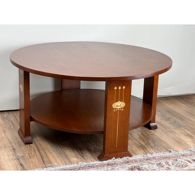 This Harvey Ellis oak cocktail table by Stickley showcases the brand’s commitment to timeless design and meticulous...