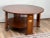 This Harvey Ellis oak cocktail table by Stickley showcases the brand’s commitment to timeless design and meticulous...
