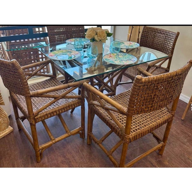 4 fully RESTORED McGuire Antalya rattan and laced leather chairs that provide TIMELESS design. Your opportunity to own...