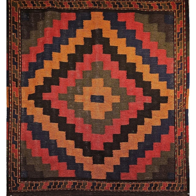 A very rare and highly collectible Persian Sofreh tribal Kilim from the mid 1900s. The handwoven tribal kilim is from the...