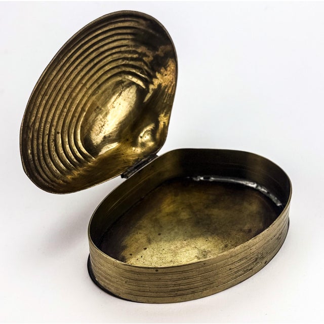 A very cool addition to anywhere that needs to be organized. This brass clam shaped box will hold many different items to...