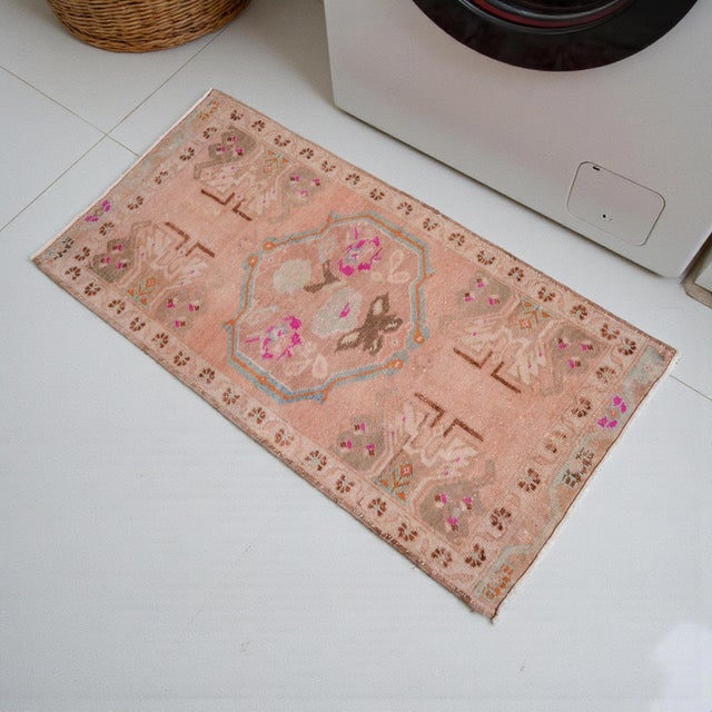 This exquisite hand-knotted vintage Turkish Oushak rug brings timeless Anatolian charm and character to any modern living...