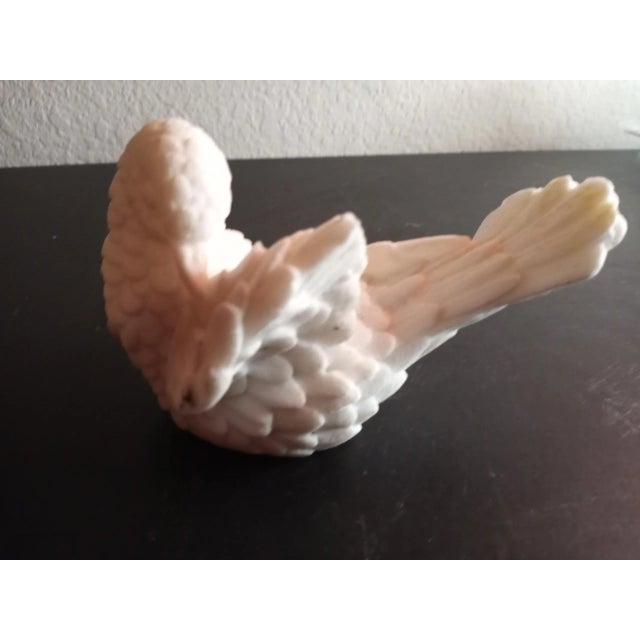This is an Alabaster 5" Bird Figurine Procured at auction