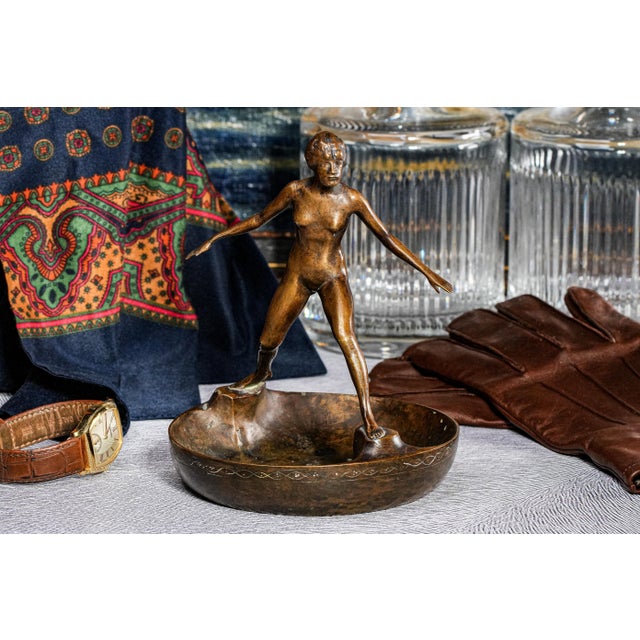 This beautifully cast bronze sculpture catchall dish brings timeless artistry and functional elegance to any space. A...