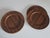12 plates from Morsbak, Denmark 1960s, made of plywood with the top plywood layers in teak and rosewood. This piece has an...