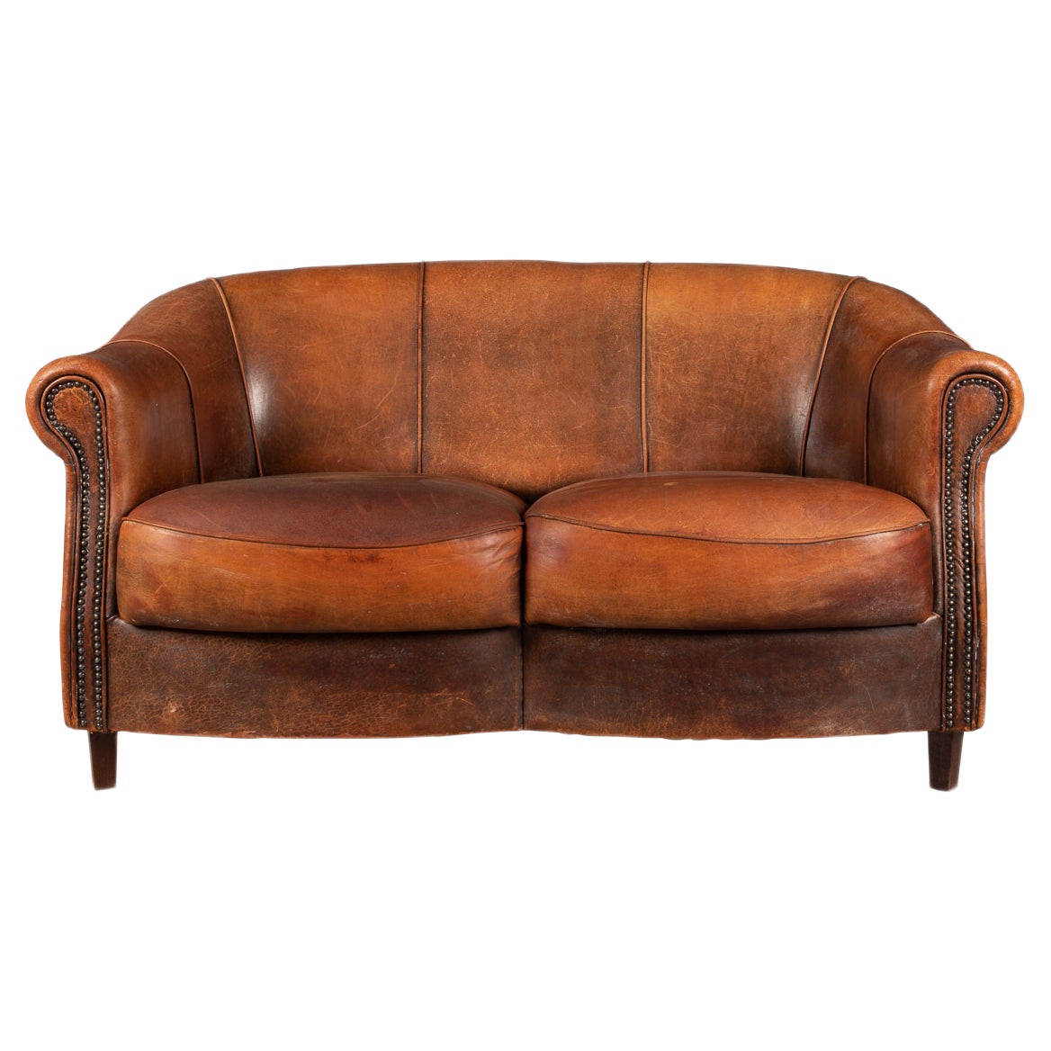 Tan two seater sofa on sale
